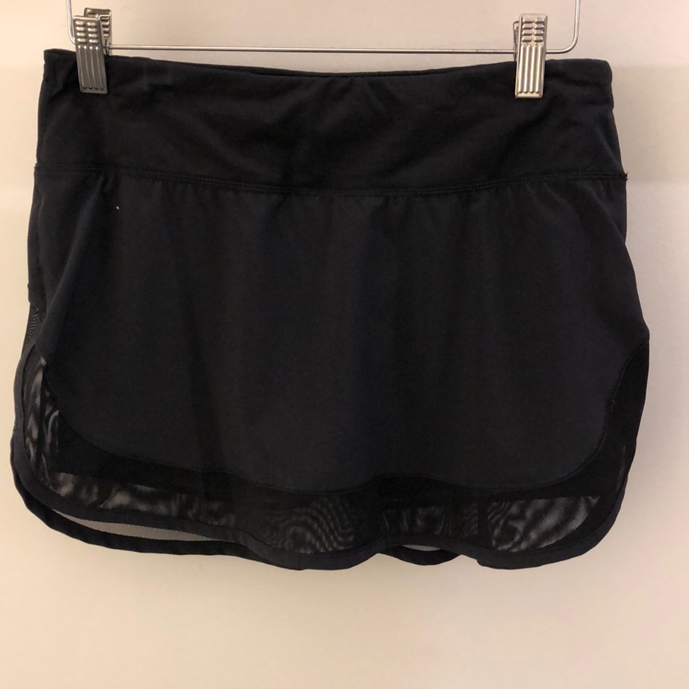 SOLD    Lululemon black with mesh skirt, sz 4,